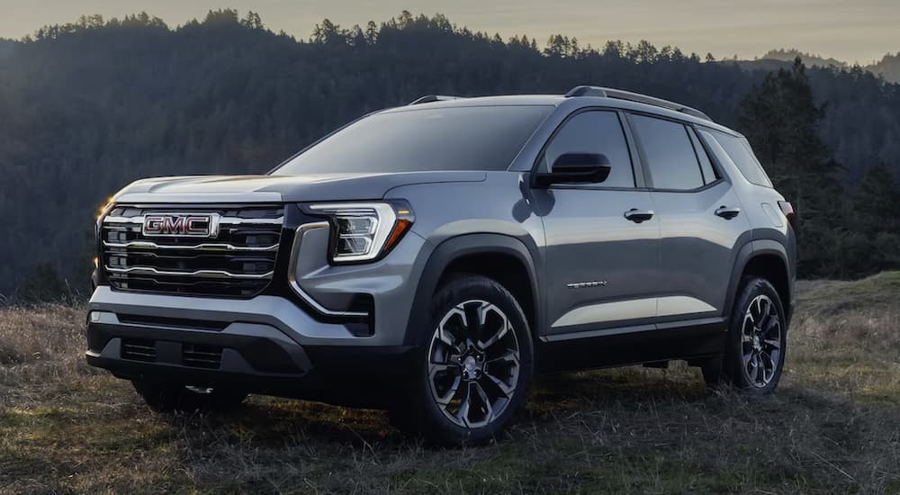 A gray 2026 GMC Terrain Elevation parked off-road