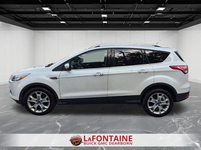 Used 2015 Ford Escape Titanium with VIN 1FMCU0JX6FUB59731 for sale in Dearborn, MI