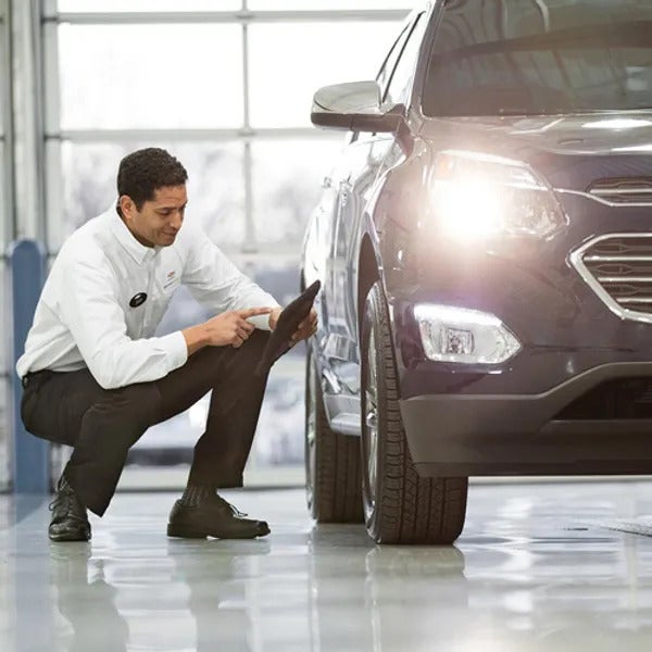 image of a man holding a tablet