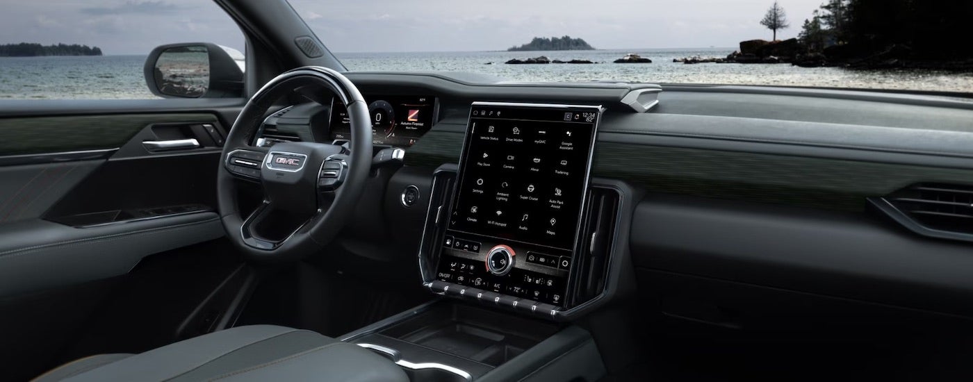 The black interior of a 2024 GMC Acadia.